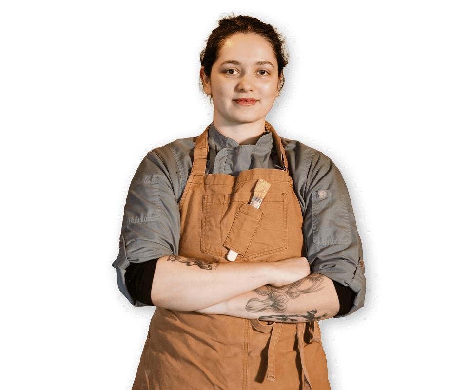 Hoosier Proper chef portrait with tattoo sleeves