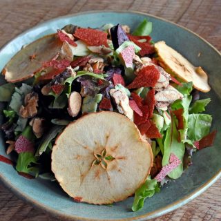 Spring orchard salad with apples, almonds, and dried berries