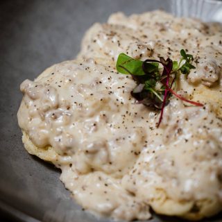 Buttermilk biscuits smothered in sausage gravy