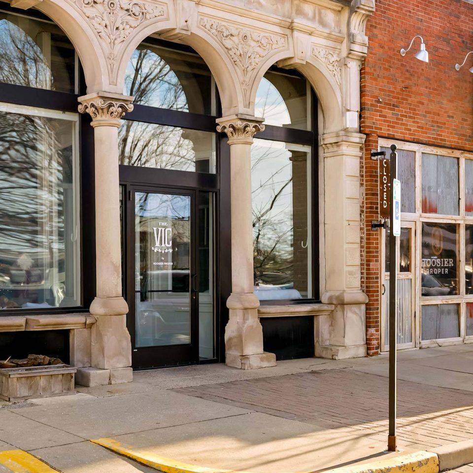 The Vic entrance with historic arched stone facade
